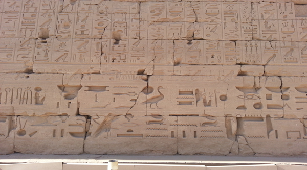 Hieroglyphs on the wall of Karnak temple.